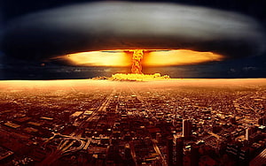 Aerial View of Nuclear Explosion Mushroom Cloud Over Urban Cityscape HD wallpaper