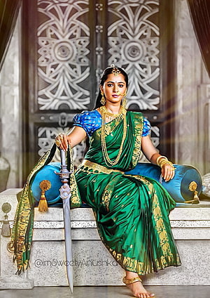 Anushka Shetty in green saree holding sword in Bahubali warrior costume HD phone wallpaper