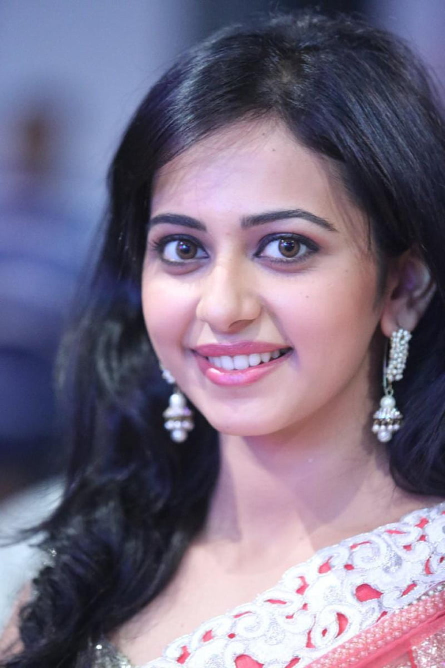 Rakul Preet Singh in an embroidered red and white sari with pearl drop earrings HD phone wallpaper
