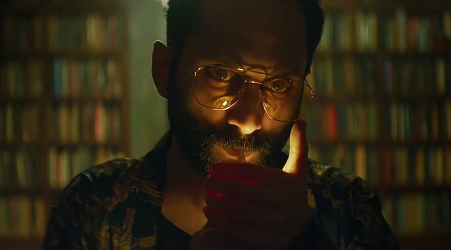 Fahadh Faasil in moody library scene from the Netflix thriller Irul HD wallpaper