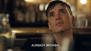 Cillian Murphy as Tommy Shelby in a moody bar scene from Peaky Blinders HD wallpaper