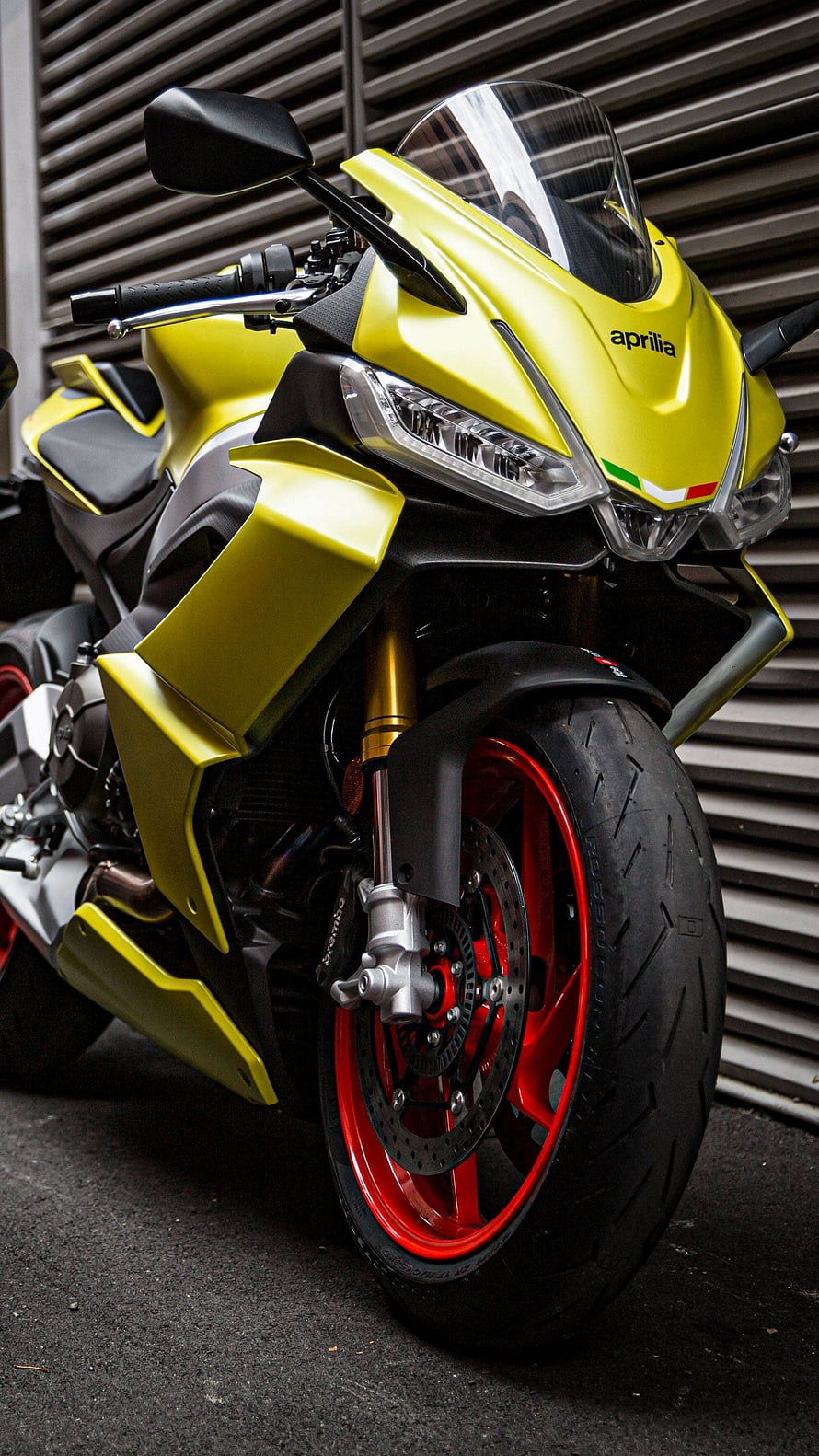 Aprilia RS 660 sport motorcycle in yellow with red wheels and gold front forks HD phone wallpaper