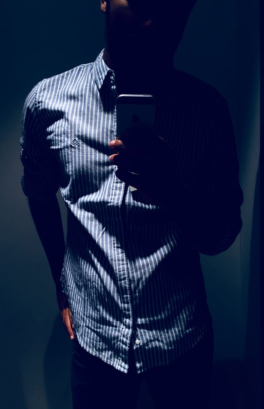 Moody Male Portrait in Striped Shirt Taking a Mirror Selfie HD phone wallpaper