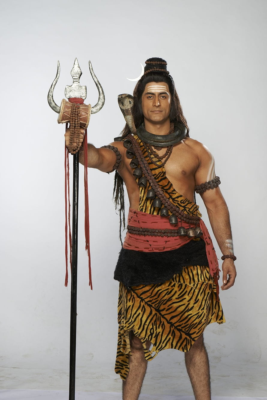 Mahadev Character Portrait in Tiger Skin and Rudraksha Beads Holding Trident HD phone wallpaper