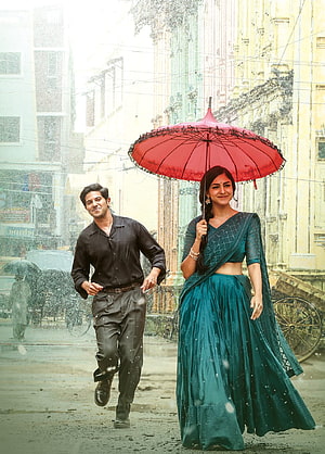Mrunal Thakur in Sita Ramam promotional still with red umbrella and teal saree HD phone wallpaper