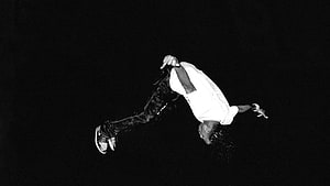 Playboi Carti Mid-Air Breakdance Pose in Black and White HD wallpaper