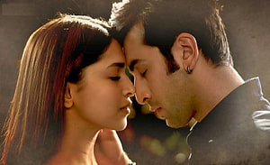 Intimate Bollywood Romantic Couple Forehead Touch in Cinematic Warm Light HD wallpaper
