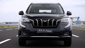 Mahindra XUV700 Front View on Highway with Distinctive Grille and LED Headlights HD wallpaper