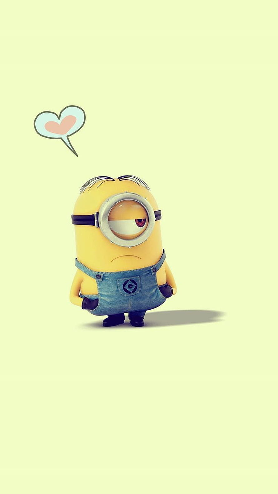 Cute Minion Character with Heart Thought Bubble on Pastel Yellow Background HD phone wallpaper