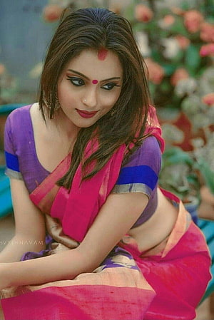 Elegant Woman in Vibrant Pink and Purple Saree with Traditional Jewelry HD phone wallpaper