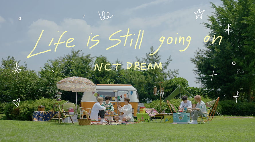 NCT Dream Life Is Still Going On Music Video Scene With Vintage Camper And Picnic Setup HD wallpaper