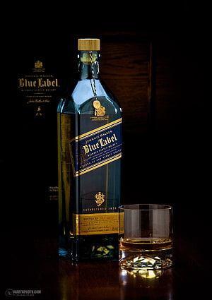 Johnnie Walker Blue Label Whisky Bottle and Glass on Dark Wooden Surface HD phone wallpaper