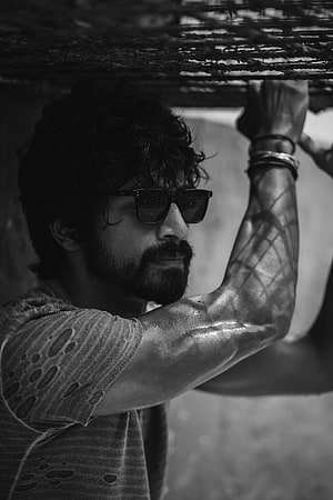 Arjun Das Black and White Portrait with Sunglasses and Bearded Profile HD phone wallpaper