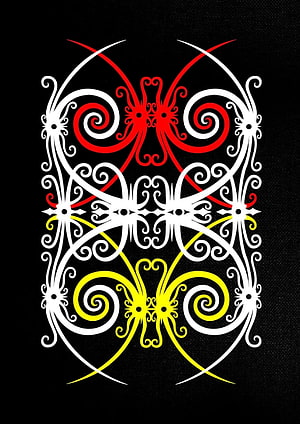 Traditional Dayak Tribal Ornament with Red and Yellow Spiral Motifs on Black Background HD phone wallpaper