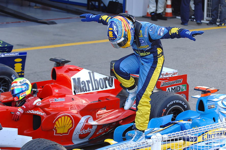 Fernando Alonso Celebrates Victory in Renault F1 Car HD wallpaper