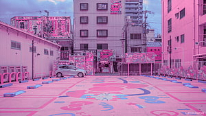 Vibrant Pink Tokyo Street Scene with Hello Kitty Murals and Urban Aesthetic HD wallpaper