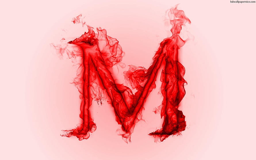Red Ink Letter M Diffusing in Water on a Soft Pink Background HD wallpaper