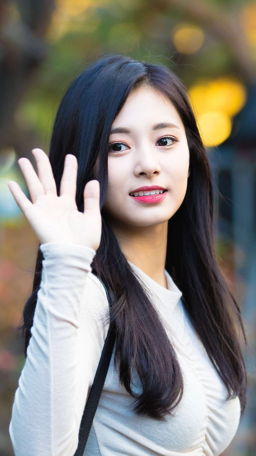 Korean Woman Waving With Long Dark Hair and Soft Smile HD phone wallpaper
