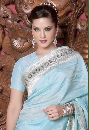 Sunny Leone in a light blue saree with silver embroidery and traditional jewelry HD phone wallpaper