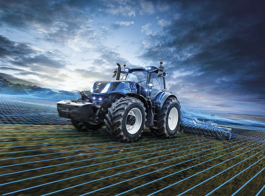 New Holland Tractor Plowing a Field with Digital Grid Overlay Under Dramatic Sky HD wallpaper