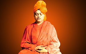 Swami Vivekananda in Traditional Saffron Robes and Turban HD wallpaper