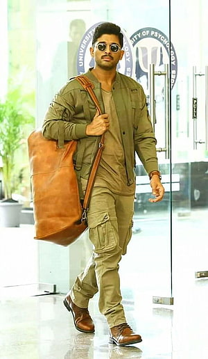 Allu Arjun in Olive Cargo Outfit with Brown Leather Bag and Aviator Sunglasses HD phone wallpaper