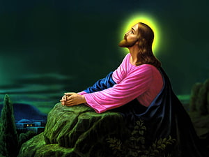 Jesus Christ Praying on a Rocky Outcrop at Night with a Glowing Halo HD wallpaper