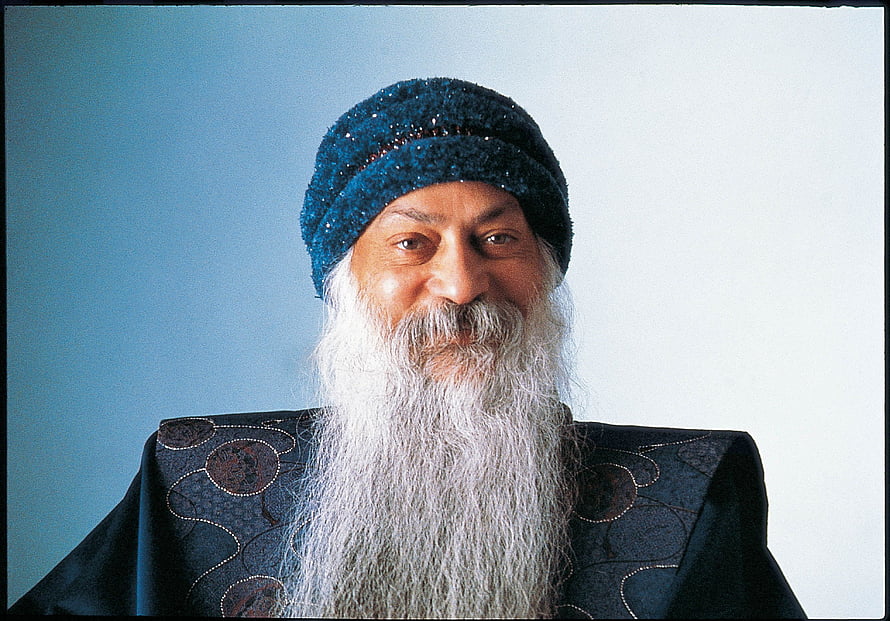Portrait of Osho Rajneesh the Indian spiritual teacher in traditional attire HD wallpaper