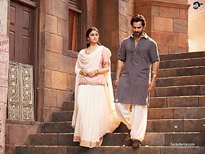 Varun Dhawan and Alia Bhatt in traditional Indian attire walking down stone steps in Kalank HD wallpaper