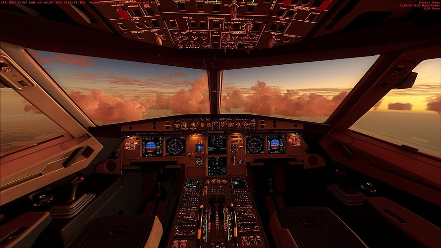 Airplane Cockpit View at Sunset with Digital Instrument Panels and Cloudy Sky HD wallpaper