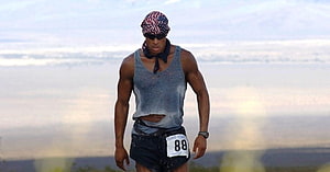 David Goggins Running in American Flag Bandana and Grey Tank Top HD wallpaper