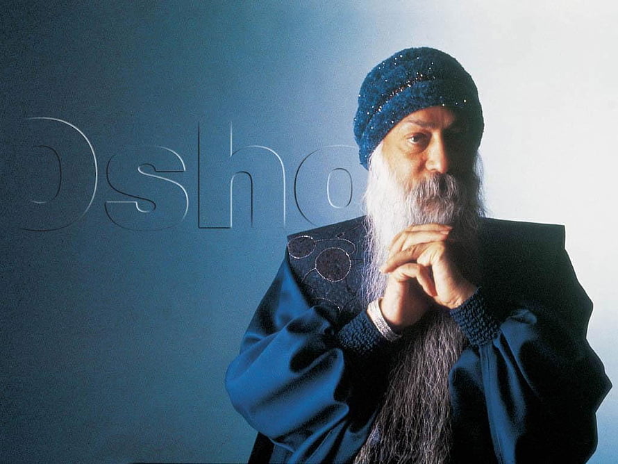 Osho Rajneesh Portrait in Blue Robes and Turban with Contemplative Expression HD wallpaper