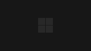 Windows 11 Four-Pane Logo on Dark Minimalist Background HD wallpaper