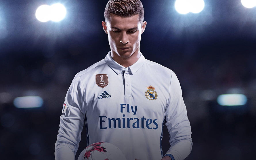 Cristiano Ronaldo in Real Madrid Home Kit Holding Football Under Stadium Lights HD wallpaper