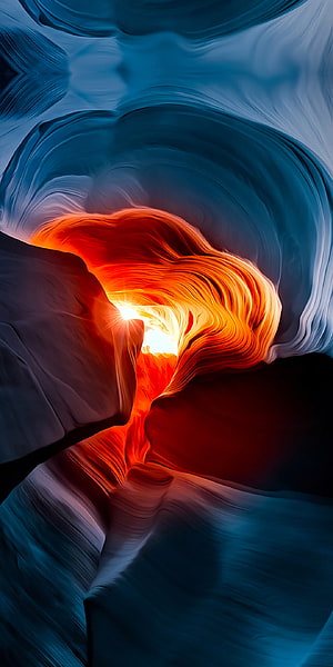 Vivid Antelope Canyon Slot with Warm Orange Light Beams and Cool Blue Rock Walls HD phone wallpaper