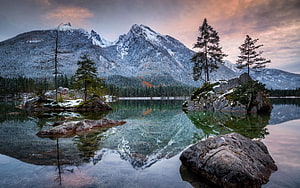 Hintersee Lake at Dusk with Snow-Capped Alpine Peaks and Rock Formations HD wallpaper