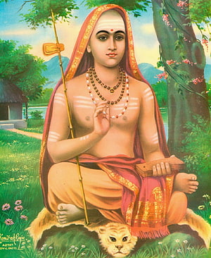 Adi Shankaracharya seated in meditation on a tiger skin with staff and beads in a lush forest HD phone wallpaper