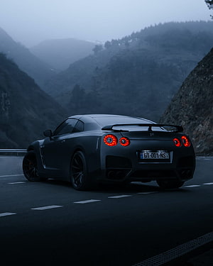 Nissan GT-R R35 Rear View on a Misty Mountain Road at Dusk HD phone wallpaper