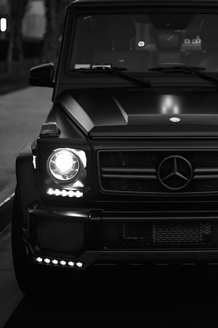 Matte Black Mercedes-Benz G-Class Front Grille and Headlight Close-Up HD phone wallpaper