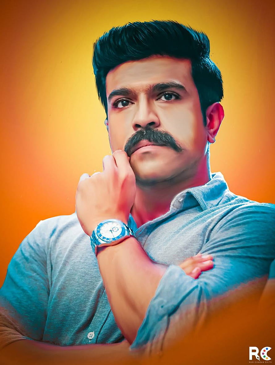 Ram Charan Portrait in Grey Shirt with Watch on Warm Orange Background HD phone wallpaper