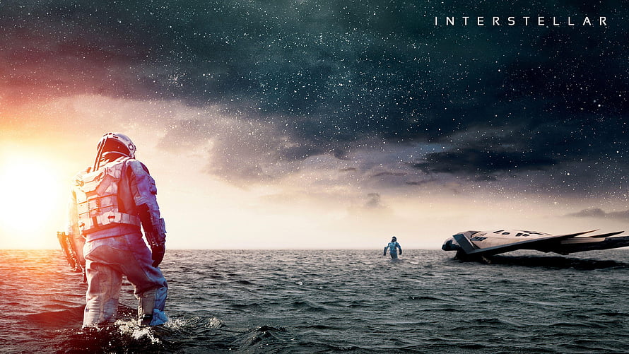 Interstellar Movie Scene: Astronauts on a Vast Ocean Under a Starry Sky HD wallpaper