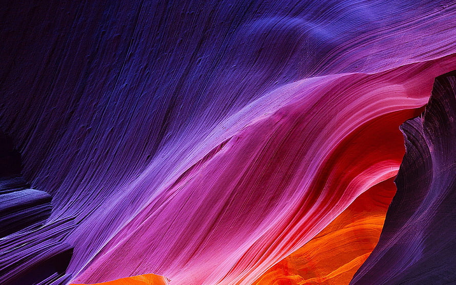 Vibrant Purple and Orange Sandstone Waves in a Slot Canyon HD wallpaper