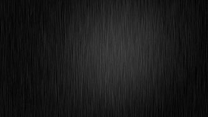 Dark Brushed Metal Texture with Subtle Vertical Grain and Soft Center Glow HD wallpaper