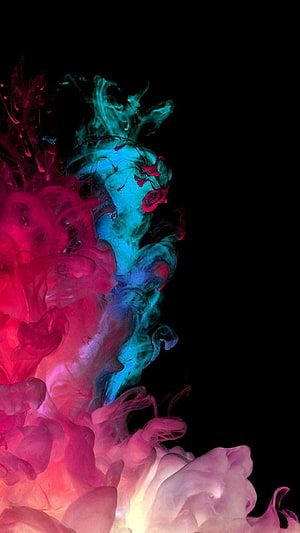 Vibrant Pink and Blue Ink Swirls in Water Against Black Background HD phone wallpaper