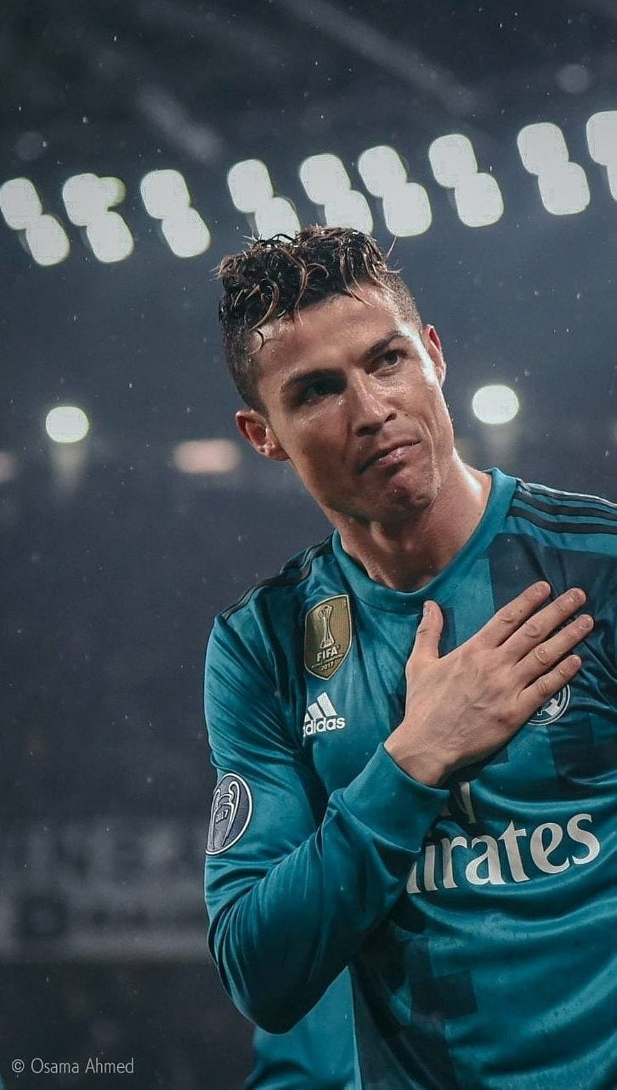 Cristiano Ronaldo in Real Madrid Teal Away Kit with Hand on Chest HD phone wallpaper