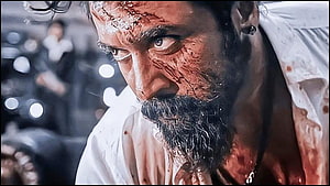 Suriya as Rolex in Vikram with bloodied face and intense cinematic close-up HD wallpaper