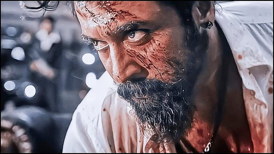 Suriya as Rolex in Vikram with bloodied face and intense cinematic close-up HD wallpaper