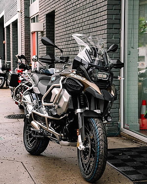 BMW R1250GS Adventure Motorcycle Parked on Urban Sidewalk HD phone wallpaper