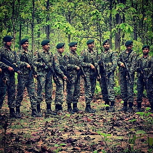 CRPF Cobra Commando Unit Standing in Formation in a Dense Forest HD phone wallpaper
