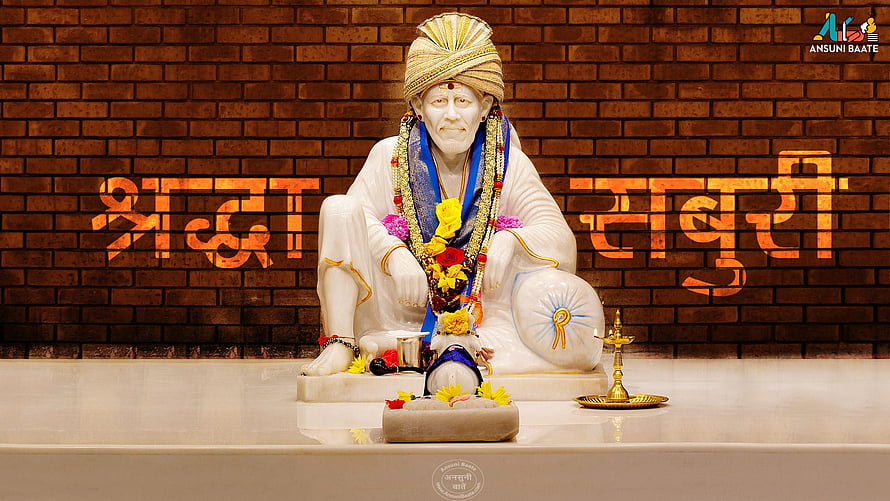 Sai Baba Statue Seated in White Garments with Flower Garland and Oil Lamp HD wallpaper